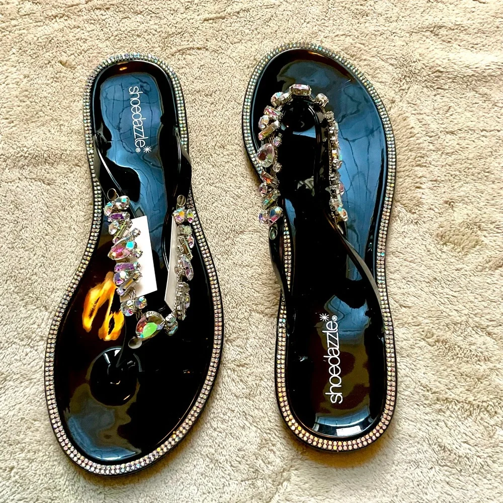 Stylish slip on embellished thong sandals in black by Shoe Dazzle. - Picture 1 of 6